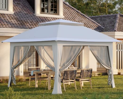 light grey 3.6 x 3m pop up gazebo in the garden, with table and chairs in the background outside a house