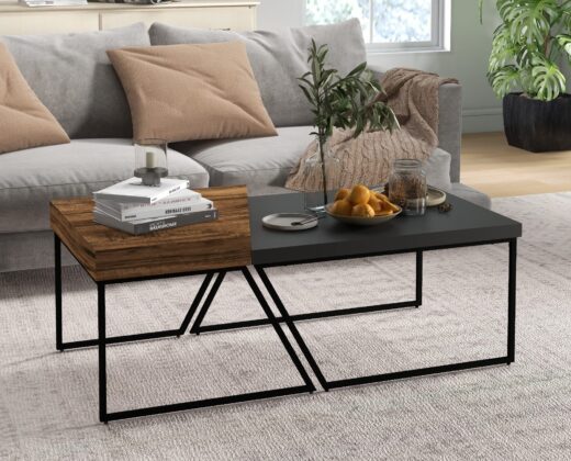 set of 2 coffee tables, one wood effect and one black, standing on a grey carpet with a sofa