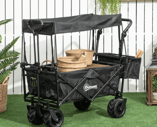 black garden trolley cart, 4 wheels and canopy, inside the cart are wicker baskets