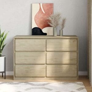solid pine wood cabinet with 6 drawers against a light grey wall, standing on a wooden floor