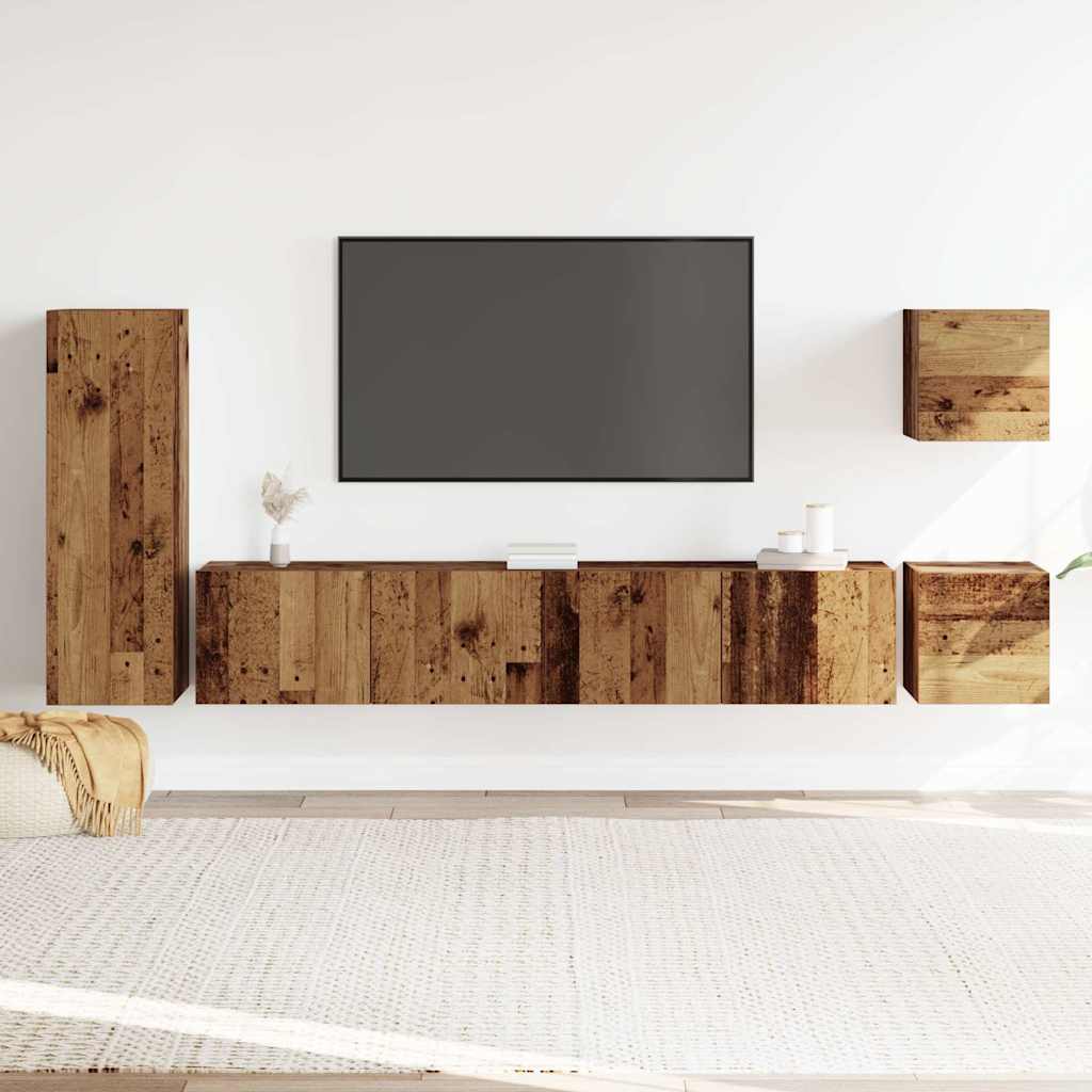 old wood 5 piece tv cabinet set and a television, mounted on a white wall,